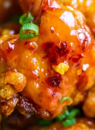 Delicious Asian Sweet Chili Chicken served with rice and vegetables