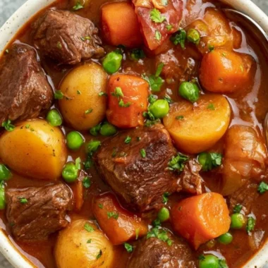 Delicious bowl of slow cooker beef stew with tender meat and vegetables