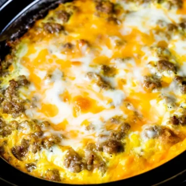 Cheesy Sausage Hashbrown served in a breakfast plate