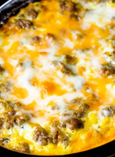 Cheesy Sausage Hashbrown served in a breakfast plate