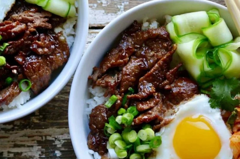 Delicious beef bulgogi bowls with fresh vegetables and rice