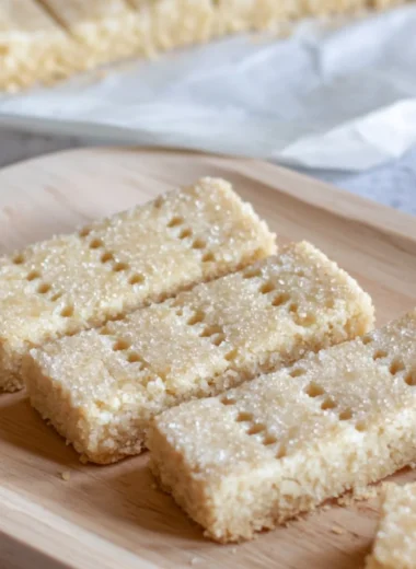 Delicious homemade Scottish Shortbread cookies on a wooden table