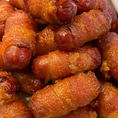 Plate of Bacon Wrapped Little Smokies served as a tasty appetizer