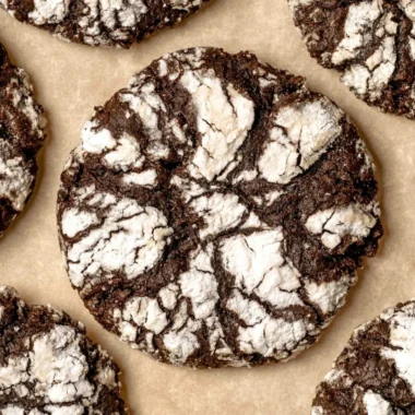 Freshly baked chocolate crinkle cookies coated in powdered sugar