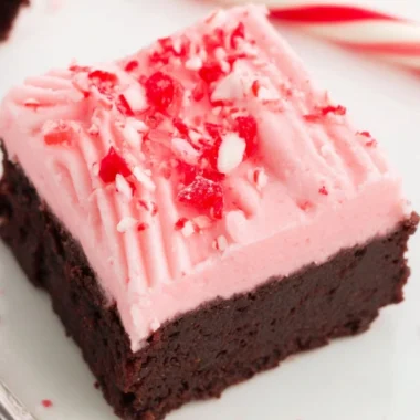 Delicious Candy Cane Brownies topped with festive crushed candy canes for Christmas.