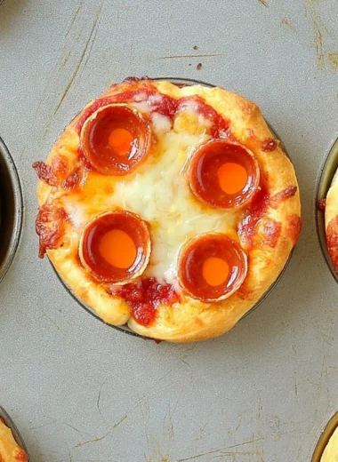 Plate of deep dish mini pizzas with various toppings