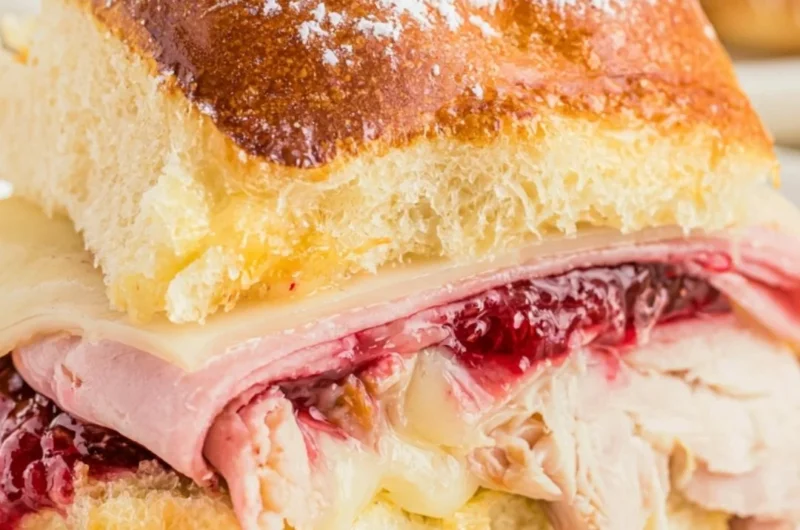 Delicious Easy Cheesy Monte Cristo Sliders served on a platter.