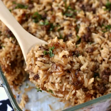 Delicious French Onion Ground Beef and Rice Casserole topped with cheese