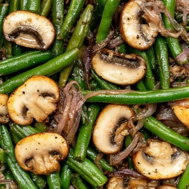 Sautéed green beans with mushrooms in a savory dish