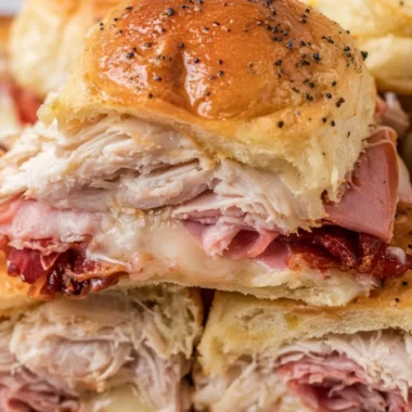 Delicious buttery baked club sliders served on a platter