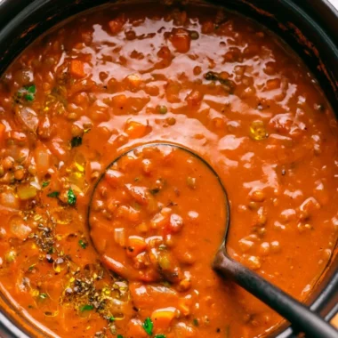 Bowl of Mediterranean lentil soup with vegetables and spices