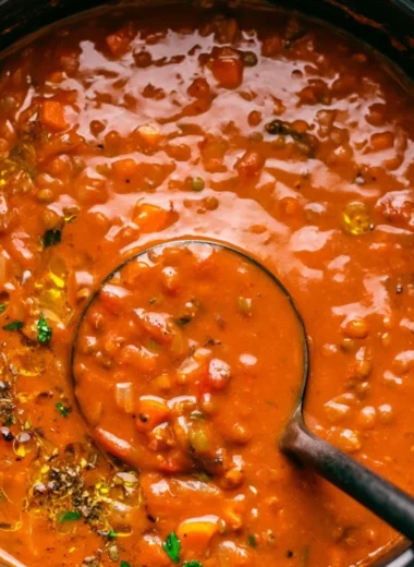 Bowl of Mediterranean lentil soup with vegetables and spices