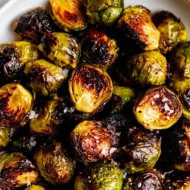 Delicious roasted Brussels sprouts garnished and ready to serve