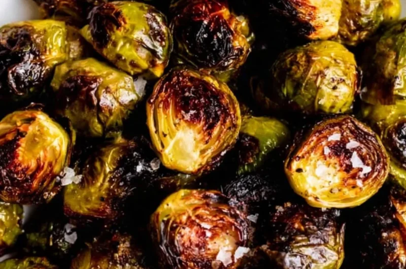 Delicious roasted Brussels sprouts garnished and ready to serve