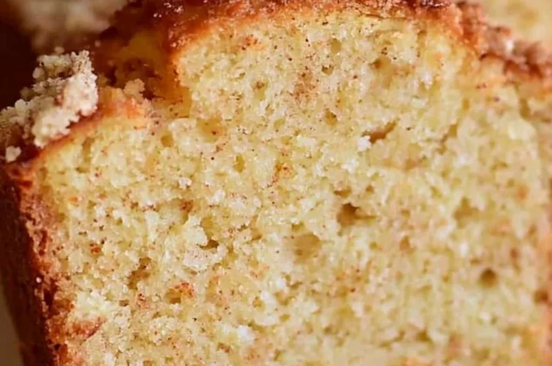 Delicious spiced eggnog loaf displayed on a festive table.